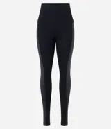 Pantalón legging negro de punto roma con cintura elástica y detalle lateral en cirre.