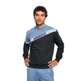 Buzo de cuello redondo Umbro con diseño de bloques de color en azul, gris y negro. Presenta el logo de la marca estampado en diagonal sobre el pecho y puños elastizados.