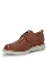 Zapato de cuero Hush Puppies modelo Rustic, color marrón tostado, con cordones y suela de EVA gris claro.