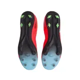 Championes de fútbol Under Armour Magnetico Elite 4 FG, color rojo vibrante con detalles en negro y logo multicolor. Diseñados para alto rendimiento en césped natural.