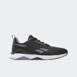 Championes de entrenamiento Reebok Nanoflex TR 2, diseñados para un movimiento dinámico. Color negro con detalles en lila y suela blanca y negra. Con parte superior de malla transpirable y refuerzos de soporte.