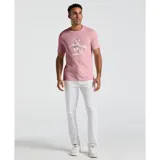 Remera de jersey color rosa con estampado del logo de la marca combinado con motivo floral.