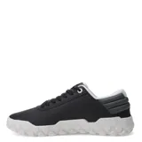 Championes urbanos Caterpillar modelo Hex +, color negro con suela blanca de diseño hexagonal. Presentan cordones al tono y logo de la marca en el lateral.