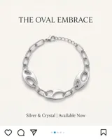Pulsera de plata con eslabones ovalados y detalles de circonias engarzadas.