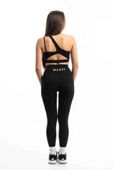 Conjunto deportivo celeste compuesto por calza larga de tiro alto y top deportivo de un hombro con logo estampado.