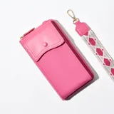 Porta celular rosa con correa de tela estampada y cierre de cremallera.