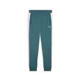 Pantalón de jogging Puma color verde esmeralda, con franjas laterales blancas y logo de la marca bordado en la pierna. Presenta puños elásticos en los tobillos y bolsillos laterales.