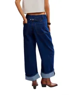 Pantalón de jean ancho de tiro alto, color azul oscuro, con pliegues pronunciados en la parte delantera y puños doblados en el ruedo.