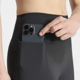 Calzas largas Adidas Optime Workout Contour de color negro, diseñadas para entrenamiento con ajuste ceñido, tiro súper alto y bolsillos en los muslos.
