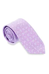 Corbata morada con pequeños lunares blancos.