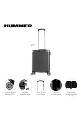 Valija rígida carry on color gris, con ruedas dobles spinner 360 grados desmontables, candado incorporado y compartimento interno con sujeción.