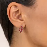 Aros de plata 925 con cuentas de rubí engarzadas.