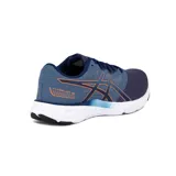 Championes Asics Fuzeblast Se, de color azul marino con detalles en naranja brillante y suela blanca. Diseñados para running y entrenamiento, confeccionados con malla transpirable y refuerzos sintéticos.
