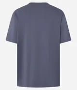 Remera boxy de manga corta y cuello redondo, confeccionada en algodón liso negro de corte holgado.