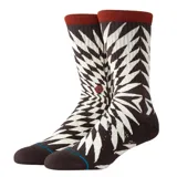 Medias Stance con diseño abstracto en espiral, color marrón y blanco, con puño acanalado color ladrillo y logo de la marca en el tobillo.