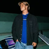 Camisa de franela Rip Curl modelo Inner Visions Fannel Shirt, de color negro con lavado enzimático, manga larga, cierre frontal de botones y un bolsillo en el pecho con logotipo bordado.
