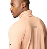 Buzo de hombre Columbia Titanium Summit Valley Half Zip, color salmón con cierre naranja en el cuello. Confeccionado en tejido de secado rápido, refrescante y reflectante del sol.