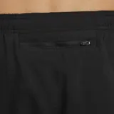 Pantalón deportivo negro Nike Challenger, con cintura elástica, cordón ajustable, bolsillos laterales y puños con cierre.