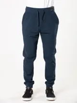 Pantalón deportivo tipo jogging color azul marino, con cintura elástica ajustable con cordón y puños ajustados.
