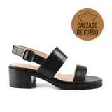 Sandalia de cuero negra con dos tiras anchas horizontales sobre el empeine y tira con hebilla al tobillo. Taco bajo cuadrado.