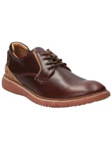 Zapato de cuero lustrado marrón oscuro Rockford modelo Tiergarden, con cordones del mismo color, detalles en cuero marrón claro en el talón y suela liviana de EVA en tono ladrillo con tecnología Honey Foam.