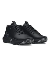 Championes de básquetbol Under Armour modelo Lockdown 7, color negro con detalles en gris. Presentan una parte superior de malla transpirable con superposiciones de cuero sintético para mayor sujeción, entresuela de EVA para una pisada ligera y reactiva, y suela exterior de caucho con patrón de tracción en espiga.