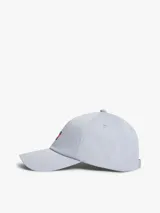 Gorra de béisbol Tommy Jeans de color celeste, con visera curva, ojales de ventilación y parche bordado con el logo de la marca en el frente.