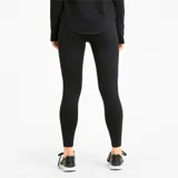Calza deportiva Puma Active Tights de mujer, color negro, con logo estampado en la pierna. Confeccionada con tecnología dryCELL para mantenerte seca y cómoda durante el ejercicio.