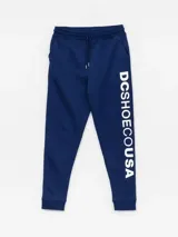 Pantalón de jogging azul con cordón ajustable en la cintura y gran estampado vertical de la marca en la pierna izquierda.