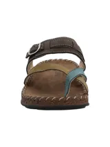 Sandalia de cuero estilo Birkenstock con diseño de tiras cruzadas en el empeine, sujetacintas para el dedo y tira ajustable con hebilla metálica. Suela de corcho y base de goma antideslizante con costuras decorativas visibles.