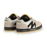 Championes de skate Emerica OG-1 color beige con detalles en negro, blanco y amarillo.