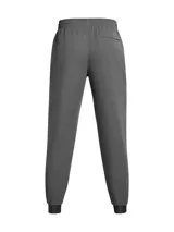 Pantalón de jogging Under Armour modelo Unstoppable Wvn de color gris, con bolsillos laterales con cierre y diseño deportivo.