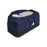 Bolso Adidas Tiro League azul marino con base negra y logo blanco. Tiene doble asa de mano, correa de hombro ajustable, compartimento principal con cierre en forma de U, bolsillo lateral de malla y compartimento inferior rígido.