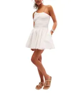 Minifalda blanca de popelina de algodón con talle medio, diseño plisado y fácil de poner.