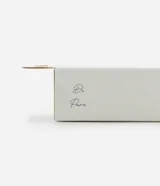 Pinza para el pelo con forma de flor color pastel.