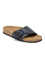 Sandalia Birkenstock Catalina Bf, color negro, con tira de Birko-Flor® nobuk ajustable con hebilla metálica. Plantilla anatómica de corcho y látex, y suela de EVA.