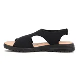 Sandalias Comfortflex de suela baja color negro con capellada de tejido elástico y plantilla en tono tostado.