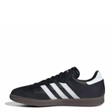 Championes Adidas Samba de mujer, color negro con las tres franjas características en plateado, puntera de ante y suela de goma translúcida.