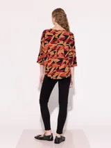 Jean chupín negro de tiro medio confeccionado en denim de algodón elastizado.