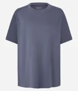 Remera boxy de manga corta y cuello redondo, confeccionada en algodón liso negro de corte holgado.