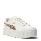 Championes Puma modelo Karmen II Animal Flair, de diseño urbano con plataforma alta. Presentan una capellada de color crema con el icónico logo de la marca en dorado y detalles laterales con estampado animal print. Cuentan con cierre de cordones y suela de goma con relieve.