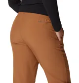 Pantalon de senderismo Columbia, color camel, con cintura ajustable, bolsillos laterales y tecnologia de secado rapido.
