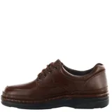 Zapato de vestir acordonado color negro, confeccionado en cuero, con suela de goma robusta y costuras reforzadas.