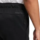 Pantalón de jogging deportivo Nike Therma color negro, con cintura elástica y logo bordado en blanco.