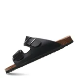 Sandalias de dos bandas negras con hebillas ajustables, base de corcho y suela de goma antideslizante.