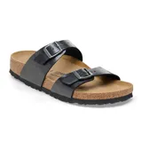 Sandalia Birkenstock modelo Sydney con dos correas ajustables de material sintético Birko-Flor en color negro. Presenta plantilla anatómica de corcho y látex, con suela de EVA antideslizante.
