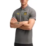 Remera polo Puma del Club Peñarol, modelo Evostrip, color negro con detalles en amarillo. Cuenta con cuello camisero, botonera frontal y el escudo del club junto al logo de la marca bordados en el pecho.