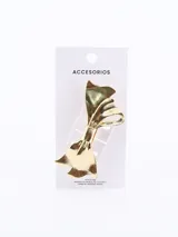 Broche para el pelo con diseño de moño en color dorado con acabado brillante.