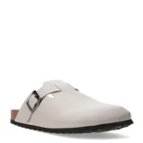 Zuecos de punta cerrada y talón abierto en color beige, con tira ajustable y hebilla metálica lateral. Poseen suela anatómica con base de corcho y planta de goma.