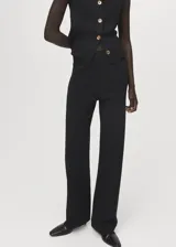Pantalon de tejido de punto fino con diseño recto y largo, de tiro medio y cintura con goma elástica.